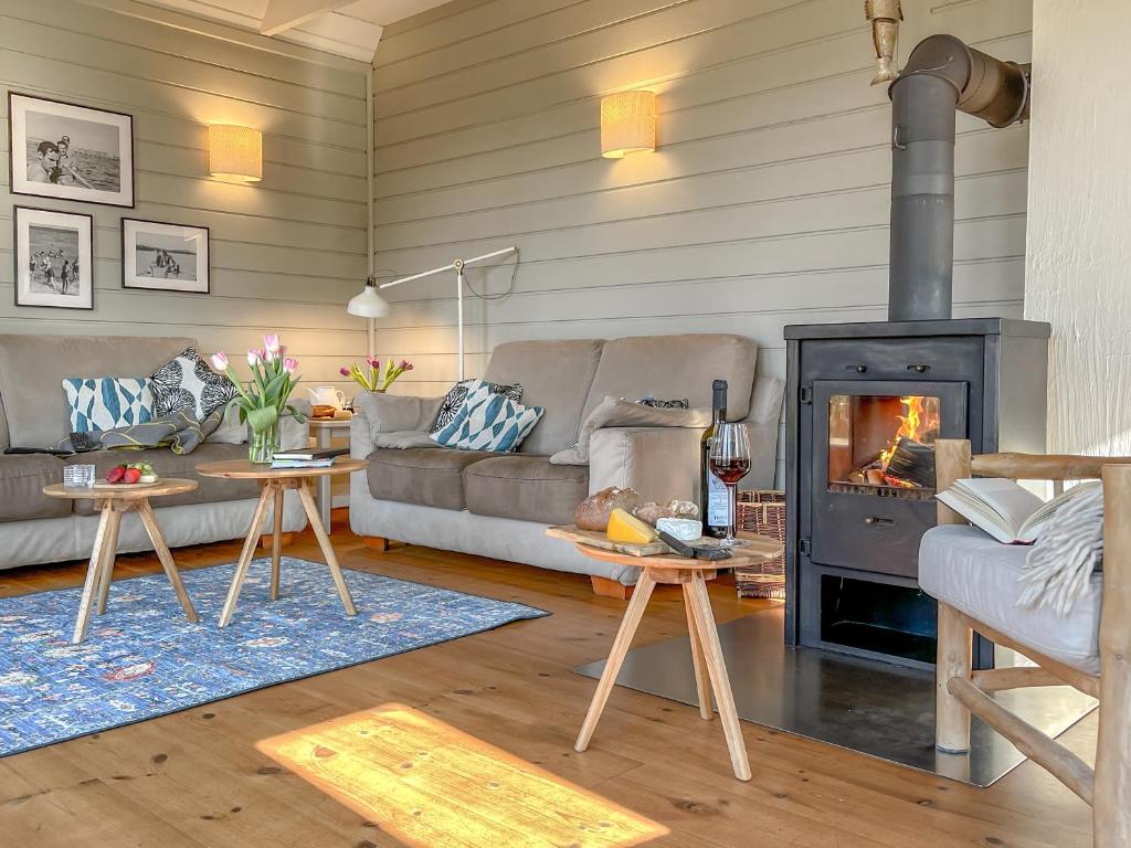 traumHaff Lotsen Romantik-Ostsee mit Kamin, privates NORDICSPA und Boot photo 1
