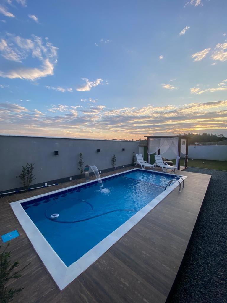 Sobrado com piscina e mesa de Sinuca e Campinho photo 3