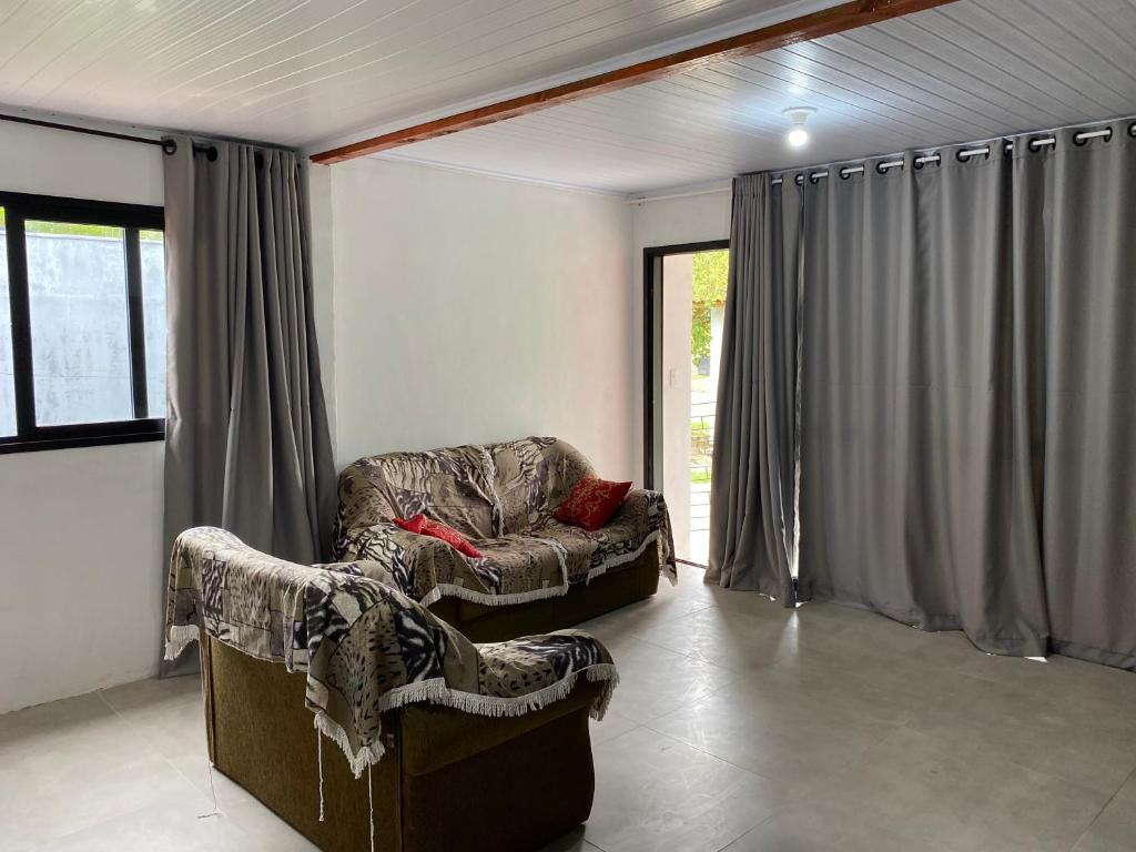 Casas de Veraneio em Torres - Frontal photo 2