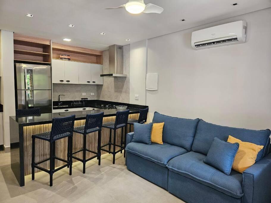 Flat na Riviera de São Lourenço com serviço de hotelaria