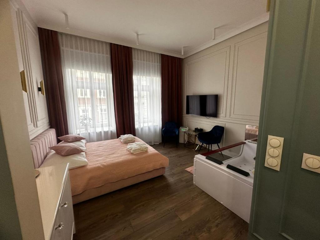 Apartament z Jacuzzi Kraków GLAMOUR Starowiślna - Tap to explore photos