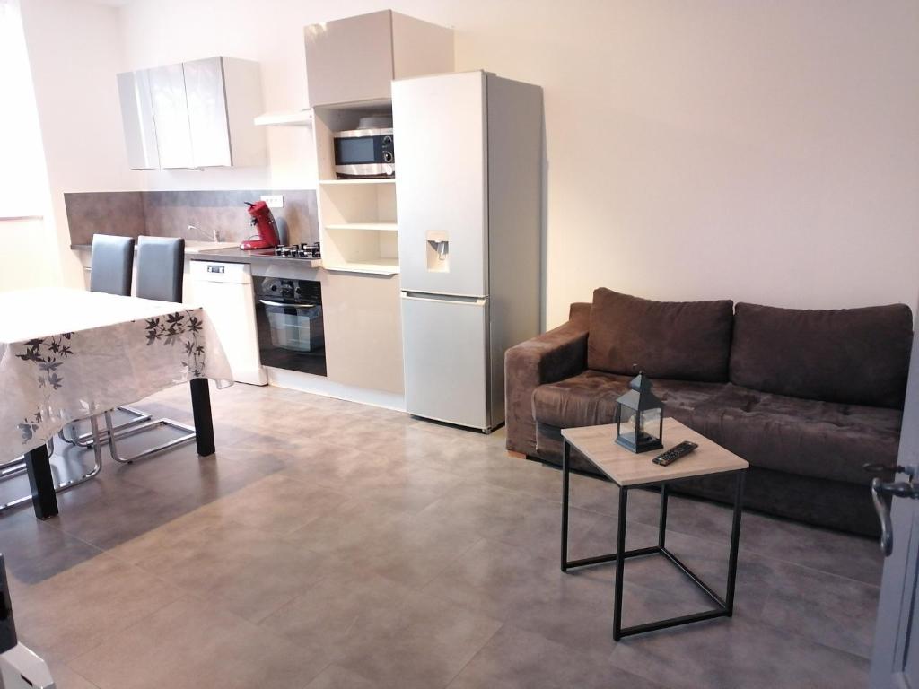 Au petit logement photo 2