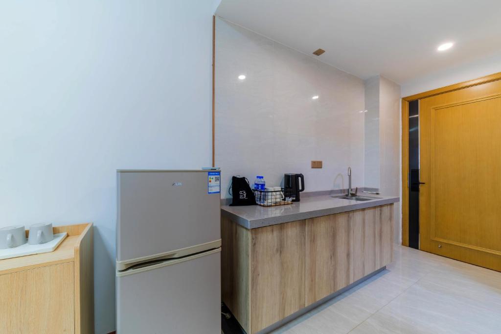 Coco Apatement - Zhongshan Tianyi International Plaza Store photo 3