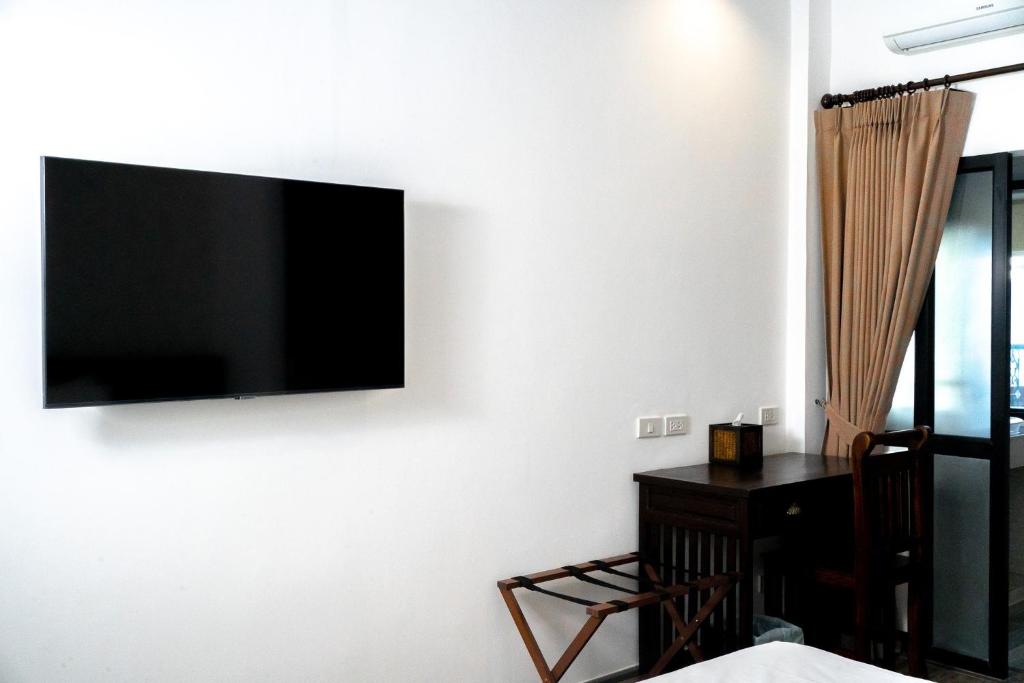 Singharaj Boutique Hotel - Tap to explore photos