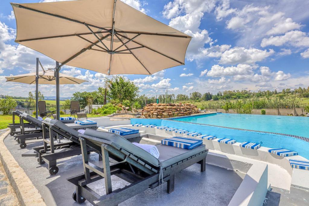 Villa Tasha Luxury Suites, Lanseria - Tap to explore photos