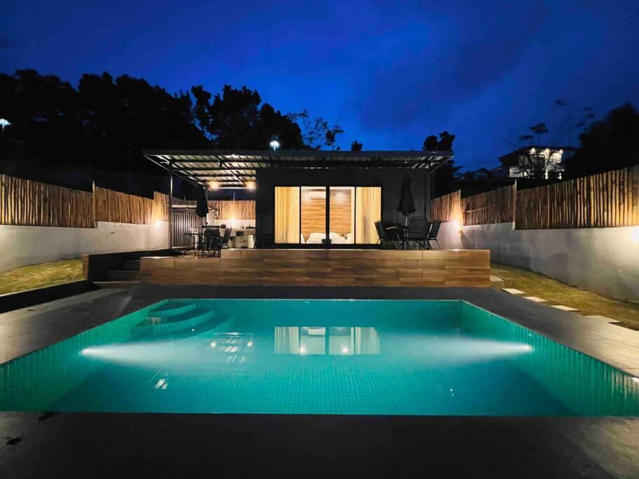 Modern minimalist cabin with pool photo 1