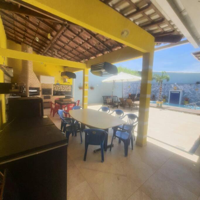 Casa nova, piscina, área gourmet e muito conforto. photo 2