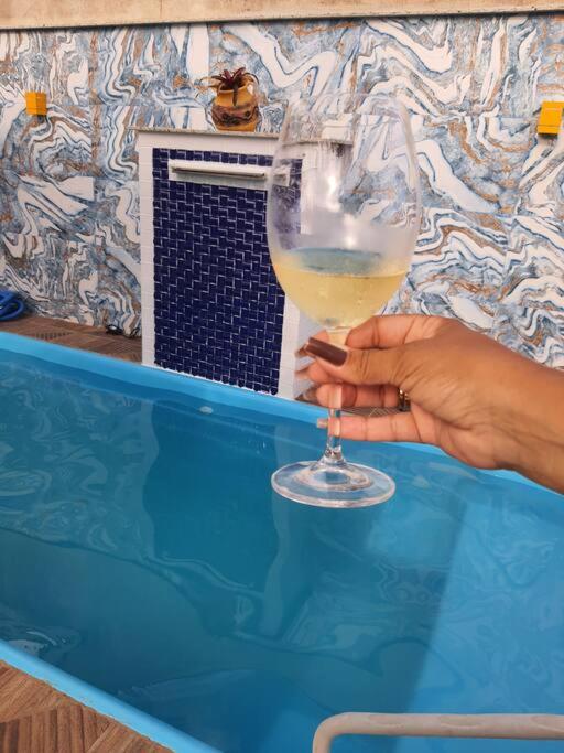 Casa nova, piscina, área gourmet e muito conforto. photo 3