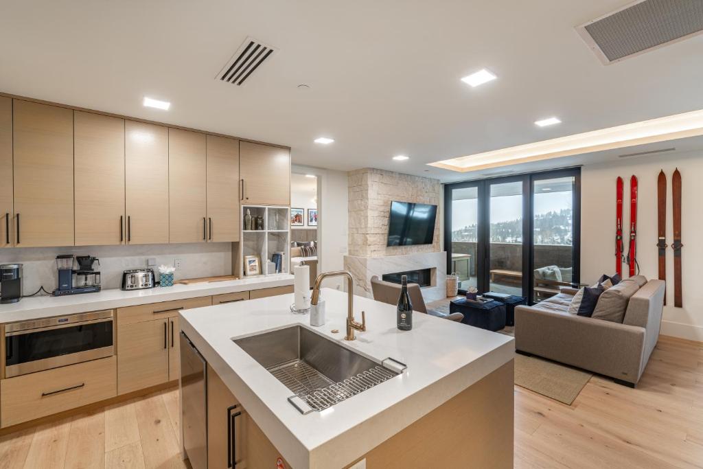 Ski in Ski Out Luxury at Empire Residences, PRIVATE HOT TUB, Onsite Ski Beach and Firepits image