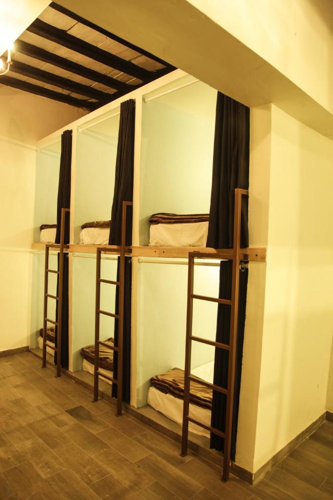 Номер (Односпальная кровать в общем номере для мужчин и женщин), Capsule Hostel