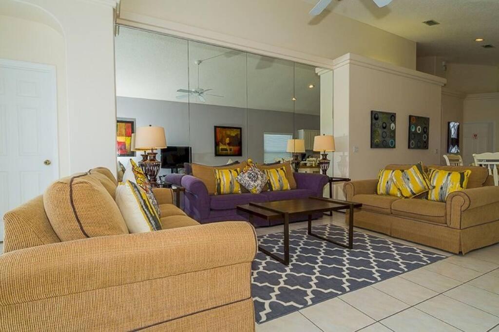 Disney Escape 4BR Villa with Pool, Spa & Fun Games Room in Clermont - Tap to explore photos