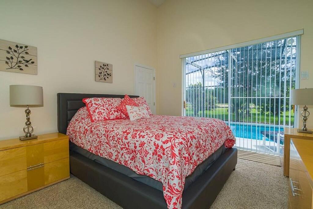 Disney Escape 4BR Villa with Pool, Spa & Fun Games Room in Clermont - Tap to explore photos