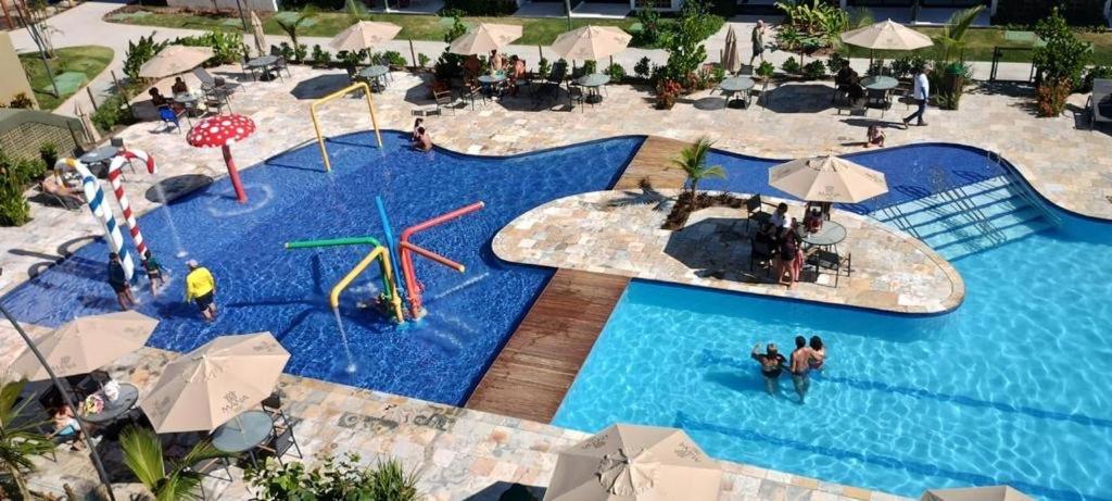 Flat com vista para piscina principal