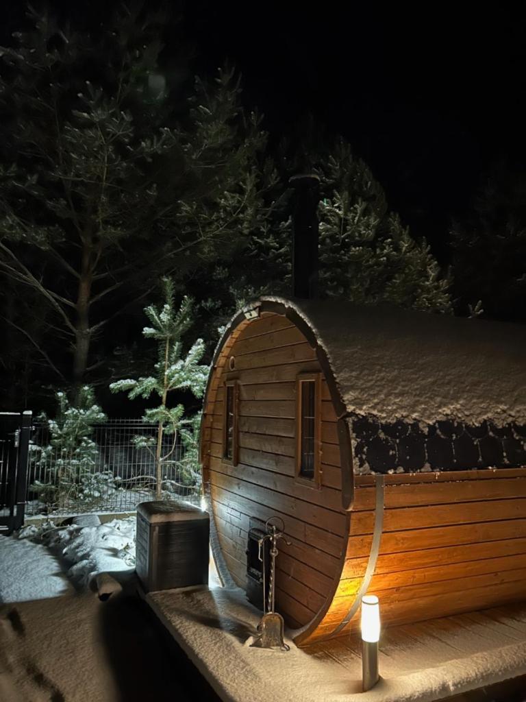 Domki trzy jeziora z zewnętrznym SPA - sauna, balia do schładzania i jacuzzi photo 3
