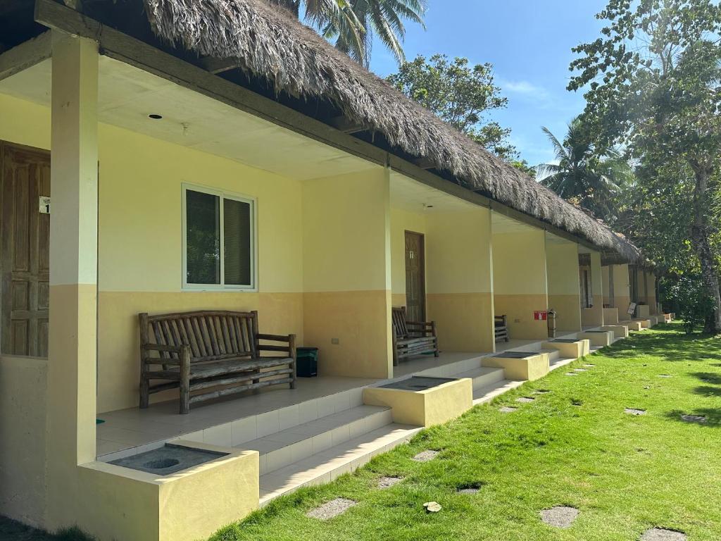 Dancalan Beach Resort - Tap to explore photos