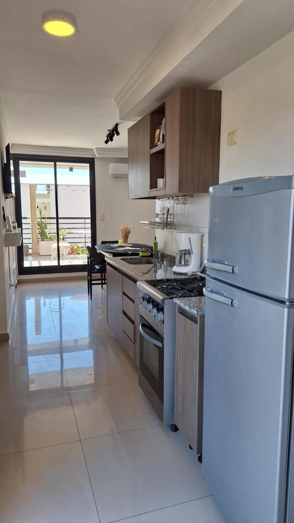 Dpto completo con terraza y cochera exterior photo 4