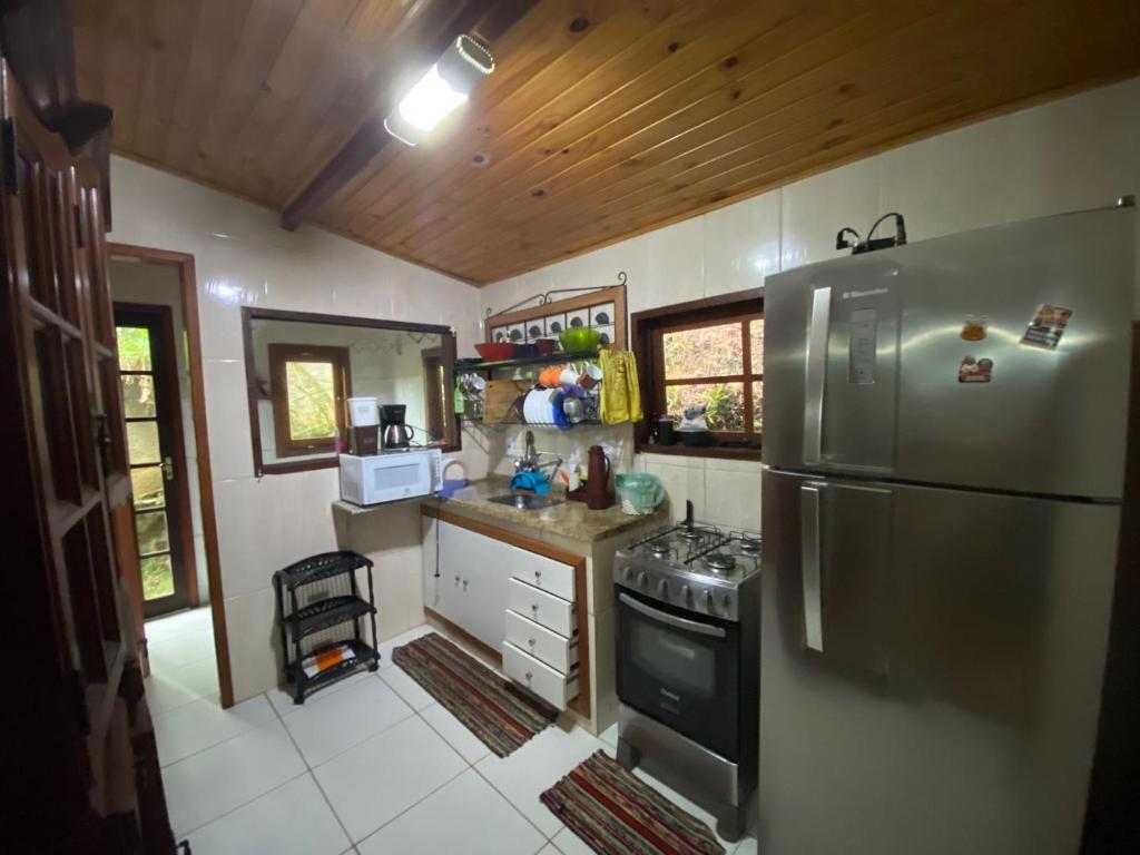 Lumiar linda vista das montanhas, com lareira, churrasqueira, wifi, Tv a cabo, casa ampla, arejada jardim pertinho do centro de Lumiar e de cachoeiras photo 3