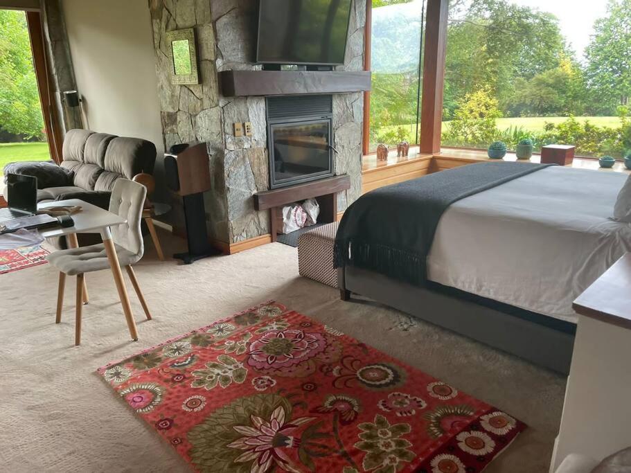 Hermosa y amplia casa 10 habitaciones con vista al lago y volcanes con chimenea jacuzzi y Hot Tub photo 2