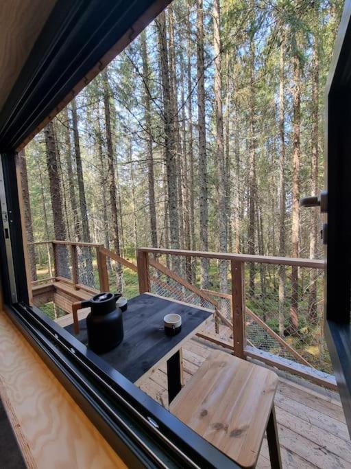 Treetop Ekne - Hytte i skogen med hengebru photo 4