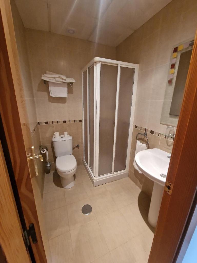 Hostal Talavera - Tap to explore photos