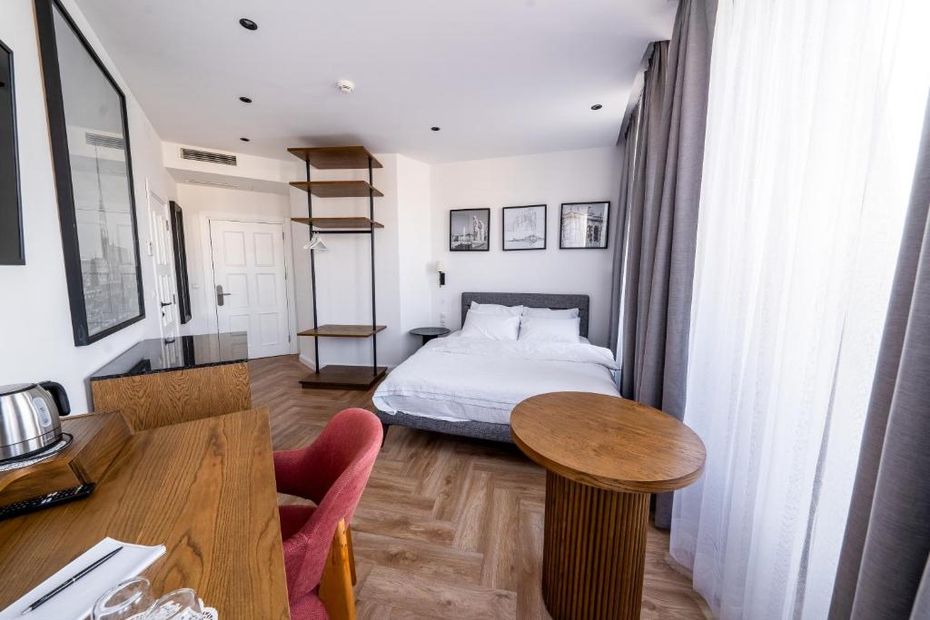 Mavie Hotel Domenig - Tap to explore photos