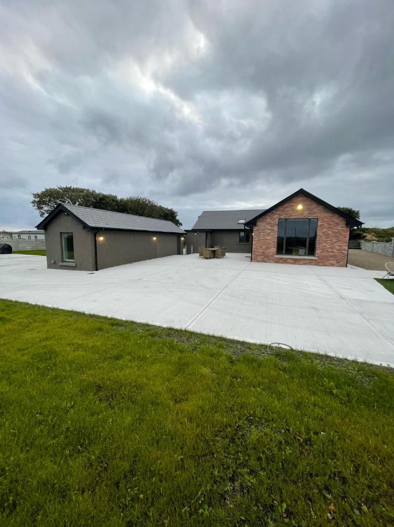 Spanish Point Luxury Home beside sea with Sauna! photo 1