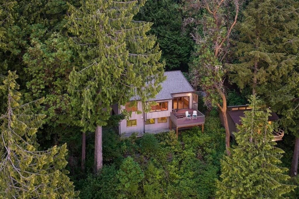 Waterfront Retreat with Fireplace, Hot Tub & Sauna photo 1