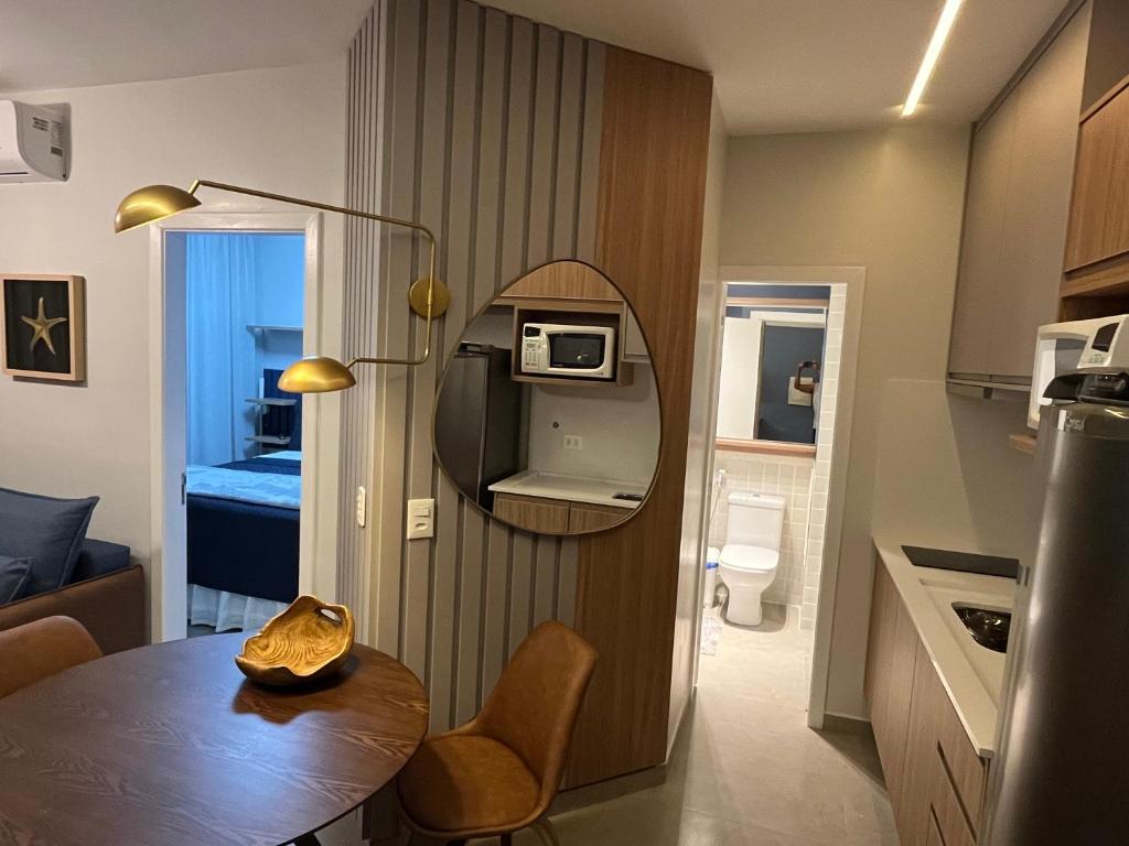 FLAT RIVIERA COM VISTINHA MAR E A 150 m DA PRAIA ! Disponível de 13 a 17 de Março - Aproveite ! photo 4