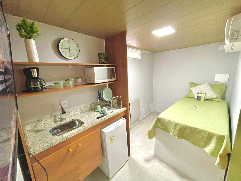 SUÍTE independente com Ar, Wifi, Smartv e Cozinha