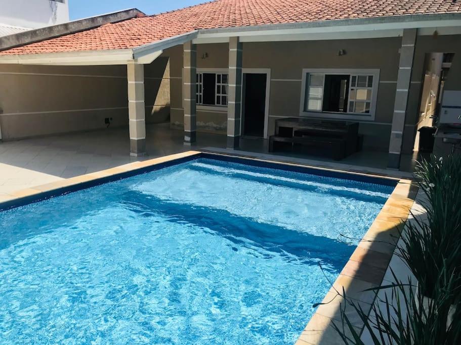 Casa de praia com piscina e churrasqueira - Indaiá Bertioga photo 2