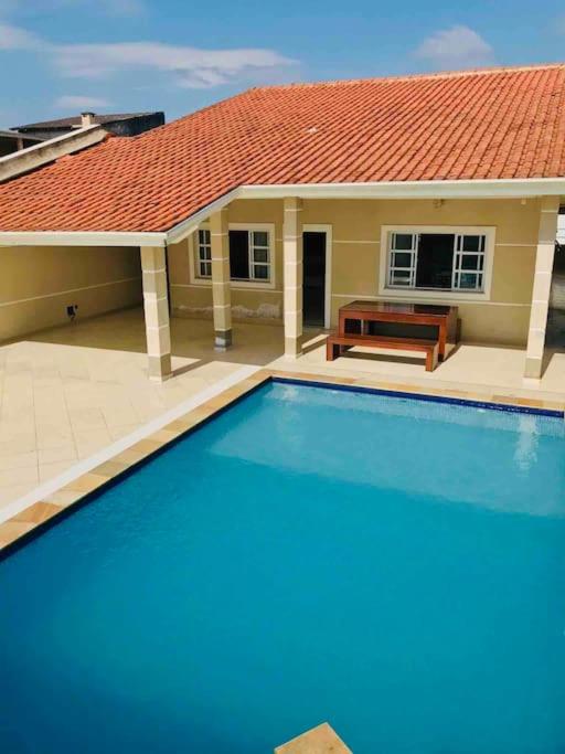 Casa de praia com piscina e churrasqueira - Indaiá Bertioga photo 4
