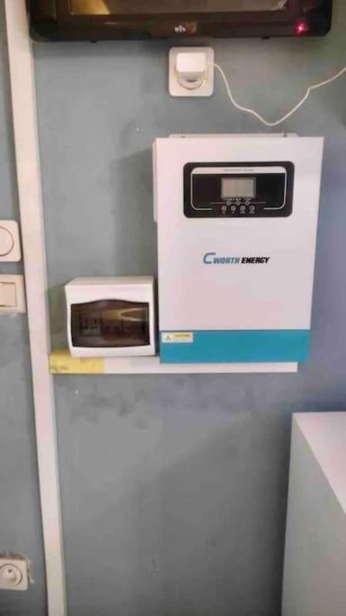 T3 à Bonapriso, clim, wifi, solaire, securite, parking photo 2