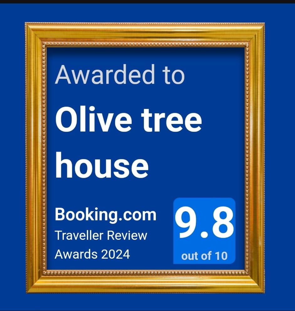 Olive tree house photo 1