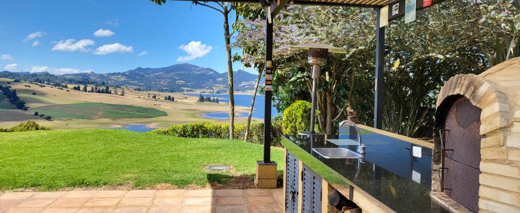 Mágica CASA FINCA represa del Sisga wi-fi, tv, BBQ photo 3