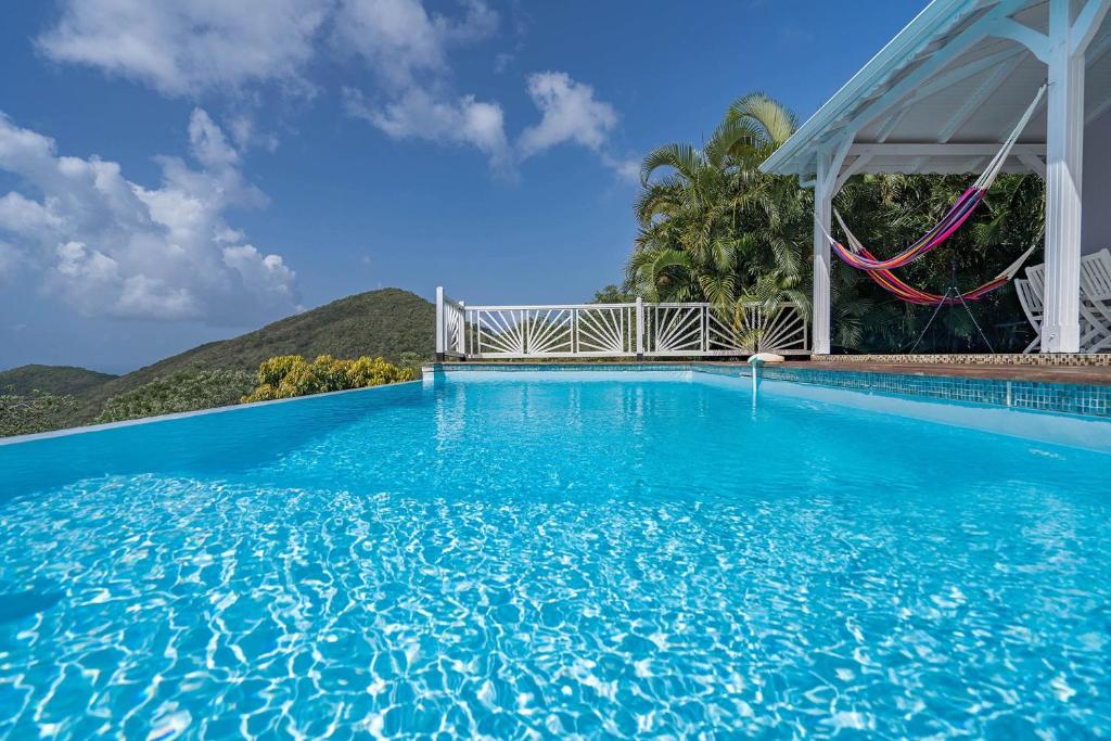 Villa Palmier rouge avec 3 chambres, piscine à débordement, magnifique vue mer et coucher de soleil photo 2
