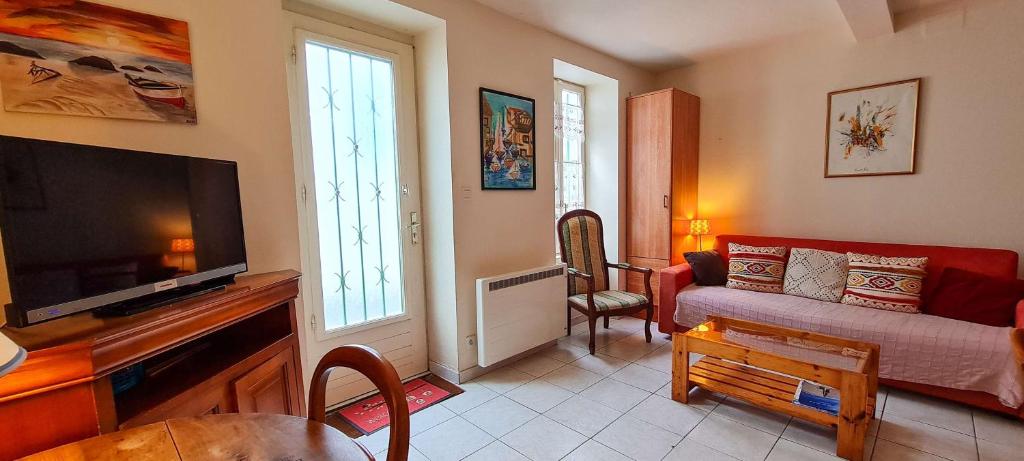 Petite maison de village au cœur du village photo 3
