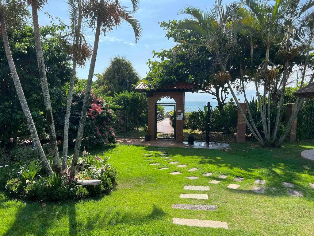 Casa pé na areia em praia paradisíaca com piscina frente mar photo 4