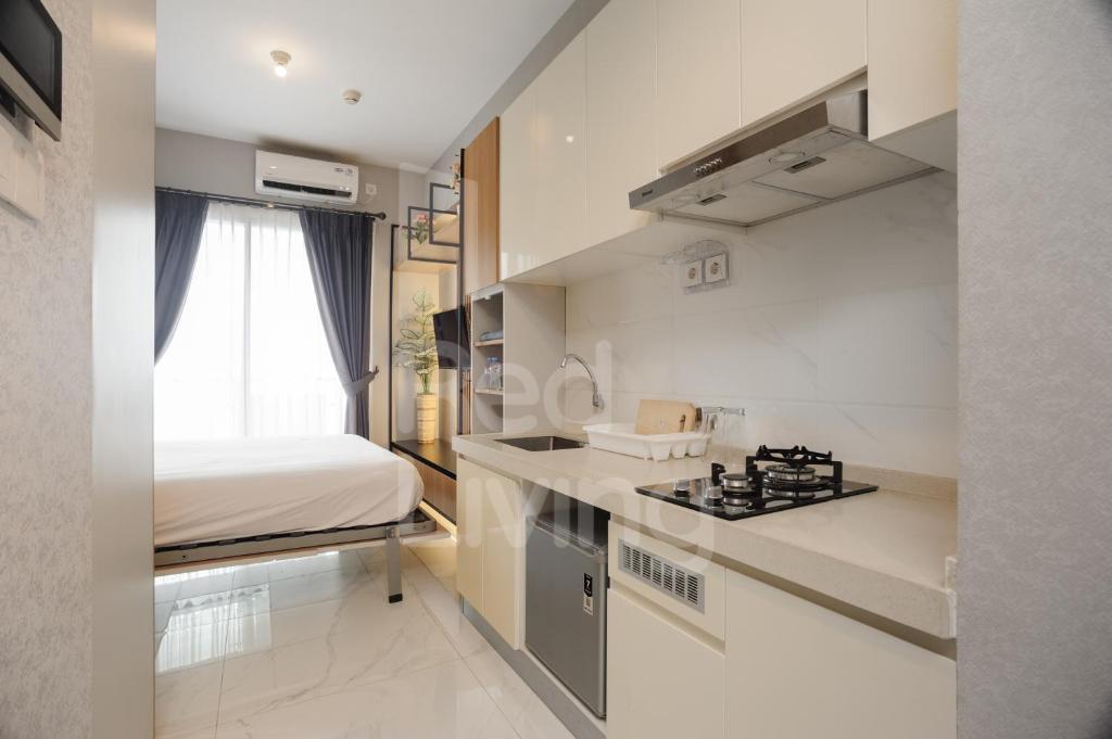 RedLiving Apartemen Sky House BSD - Lovely Space Tower Leonie photo 3