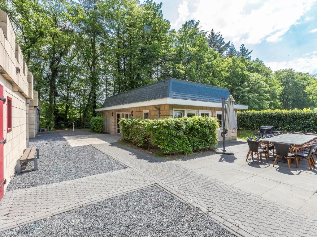 Designed home with bedstead, surrounded by forest photo 3