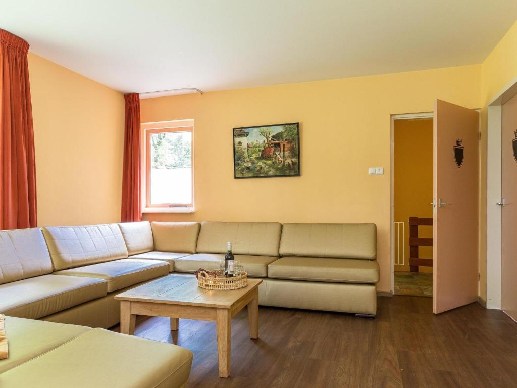 Cozy decorated house with fireplace, surrounded by forest photo 2