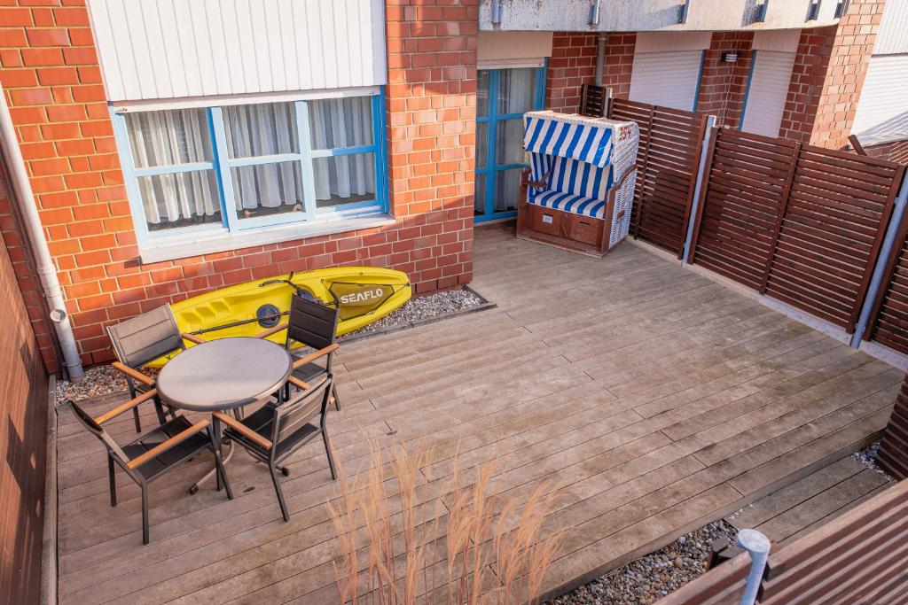 Moderne Wohnung mit großer Terrasse in erster Reihe am Deich, Wallbox, Kajak