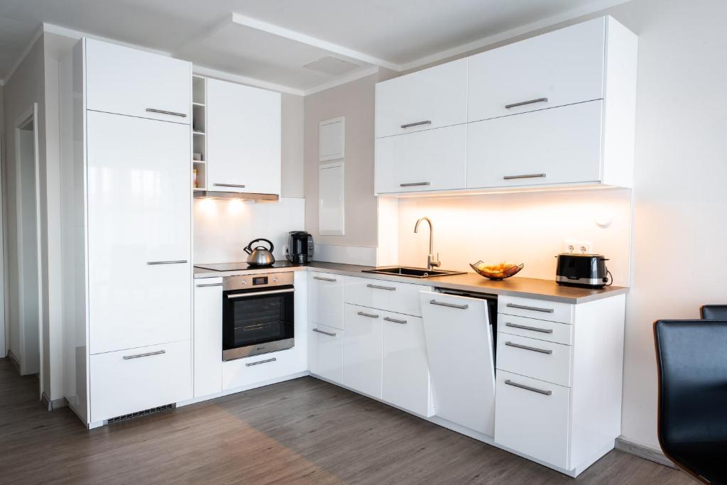 Moderne Wohnung mit großer Terrasse in erster Reihe am Deich, Wallbox, Kajak photo 2