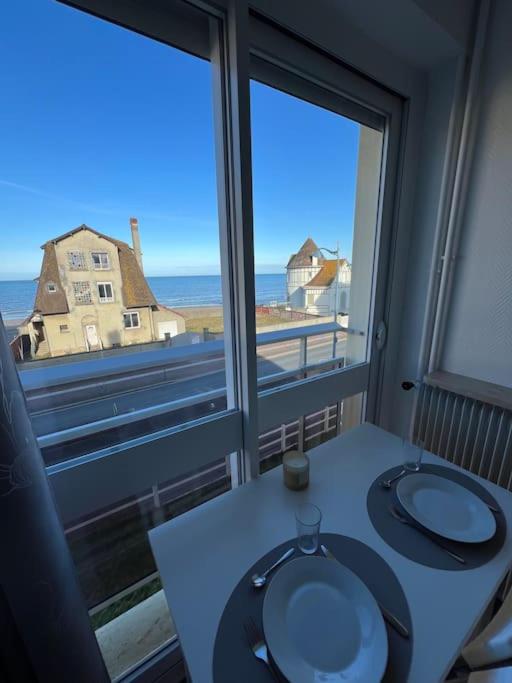 Appartement panoramique face mer photo 1