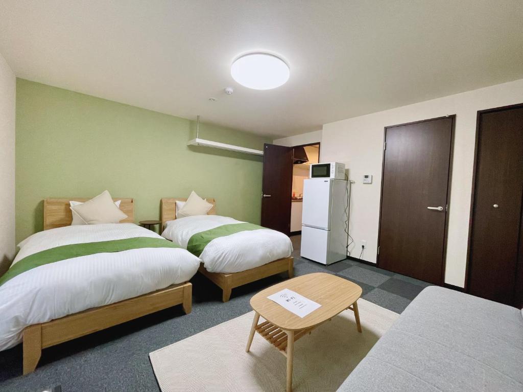 Calm Stay Nijo Room Type - Twin Room with Extra Bed