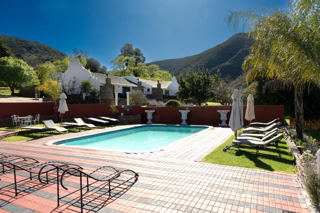 Old Mill Lodge, Seasonal Working Ostrich Farm & Restaurant, Oudtshoorn photo 1