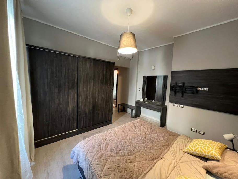 Lovely 2BR Apartment with Garden and Barbecue Area