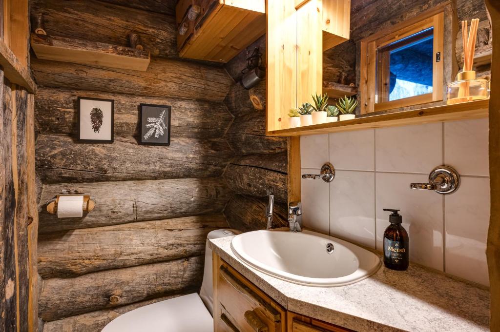 Kuusirinne 2A - a log cabin near the slopes of Ruka photo 3