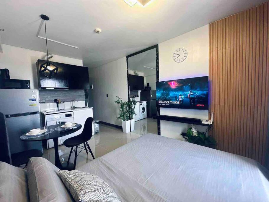 Affordable modern condo w/ Pool photo 2