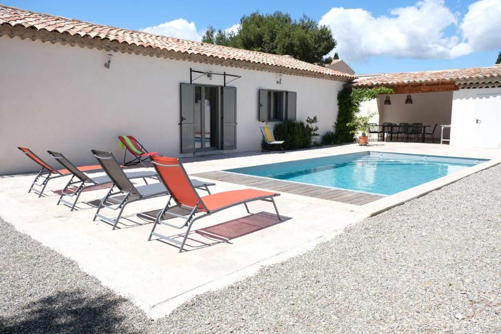 charming vacation rental with heated pool at the foot of the alpilles, in aureille, close to the center of the village on foot, sleeps 6/8 people in provence. photo 1
