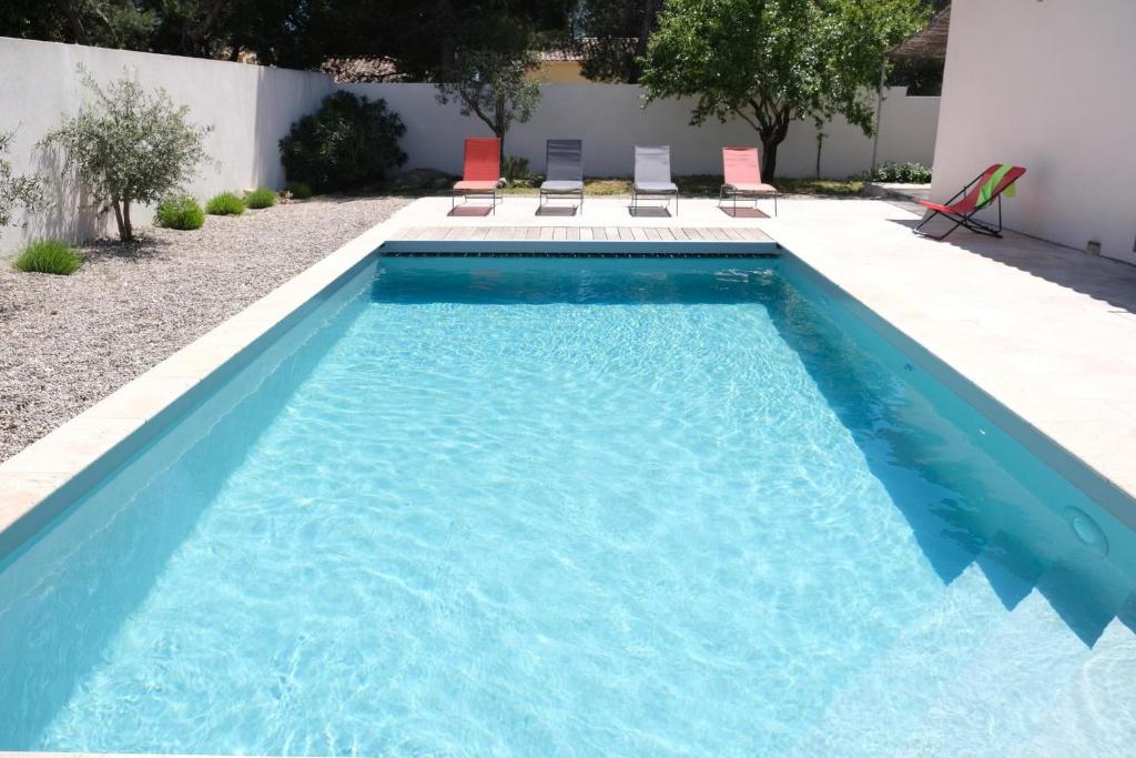 charming vacation rental with heated pool at the foot of the alpilles, in aureille, close to the center of the village on foot, sleeps 6/8 people in provence. photo 3